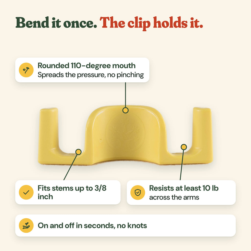 A yellow plant training clip: rounded 110-degree mouth, fits stems up to 3/8 inch, resists at least 10 lb across the arms, on and off in seconds