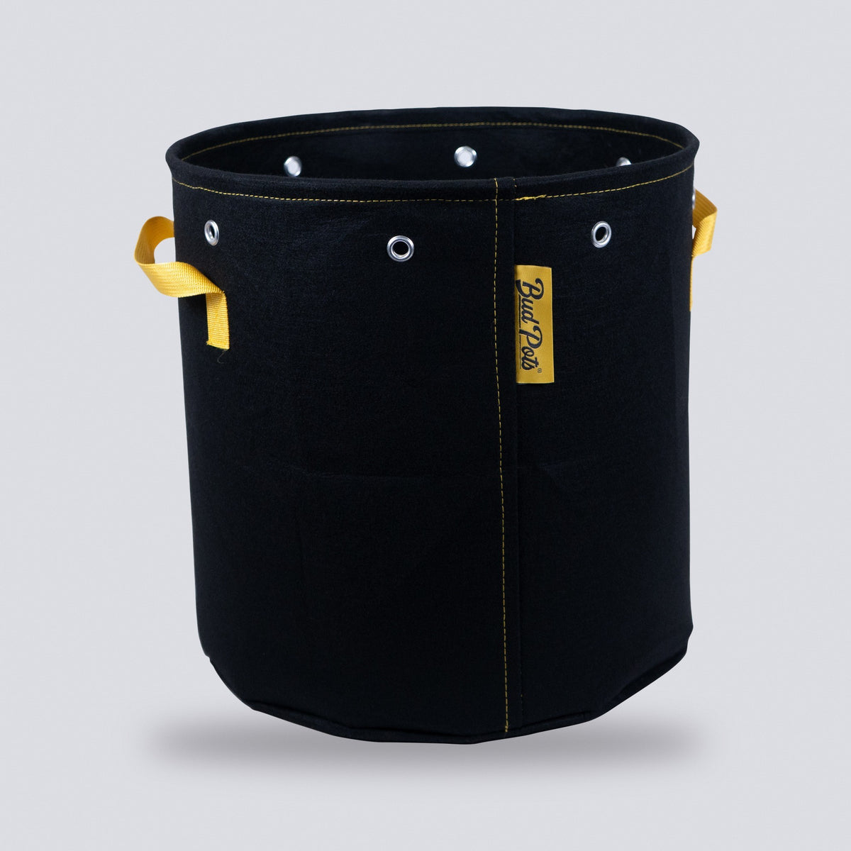 10 gallon black fabric grow bag with handles on a grey background