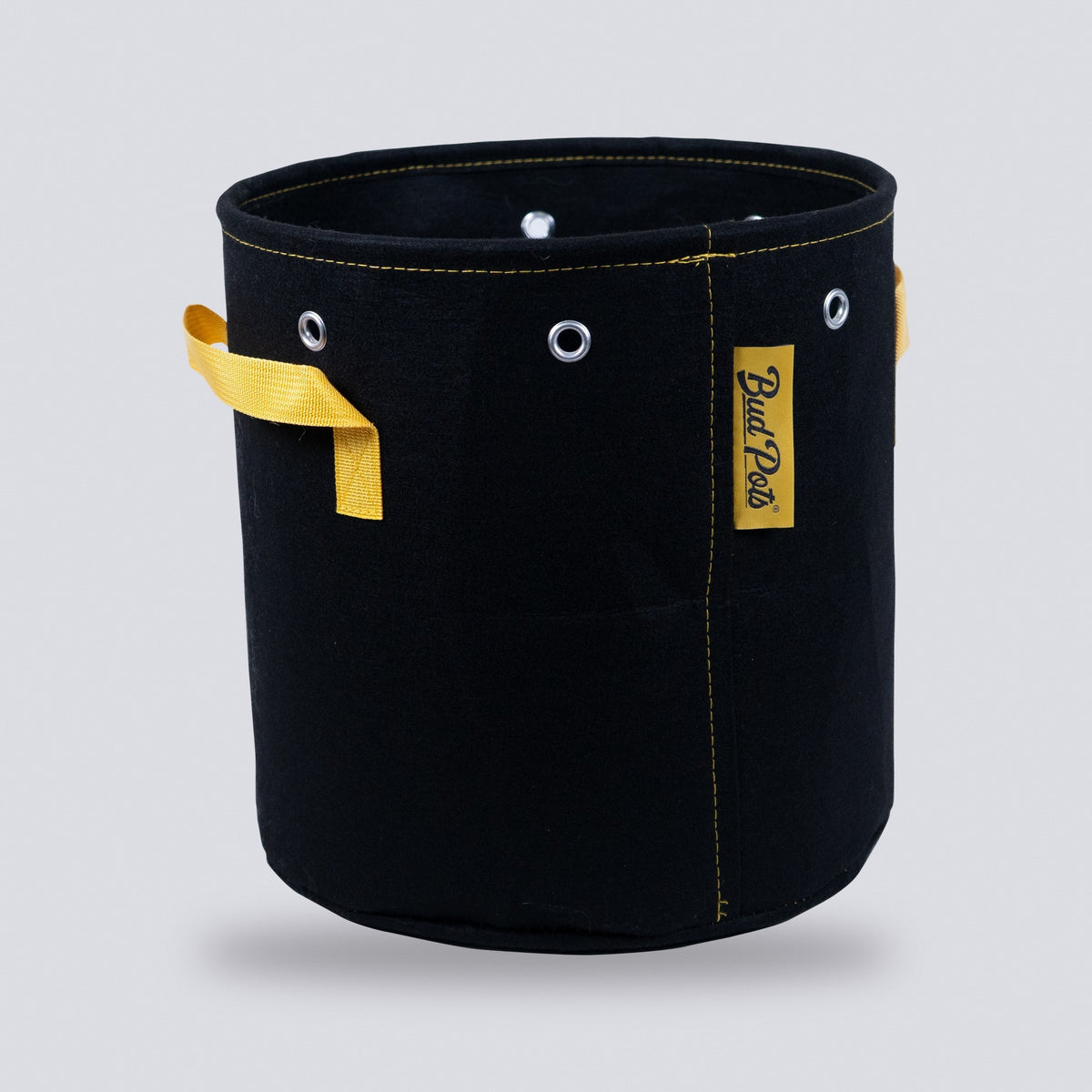 5 gallon black fabric grow bag with handles on a grey background