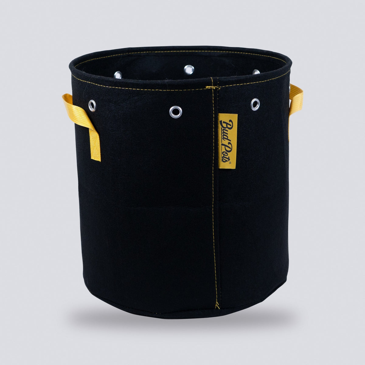 7 gallon black fabric grow bag with handles on a grey background