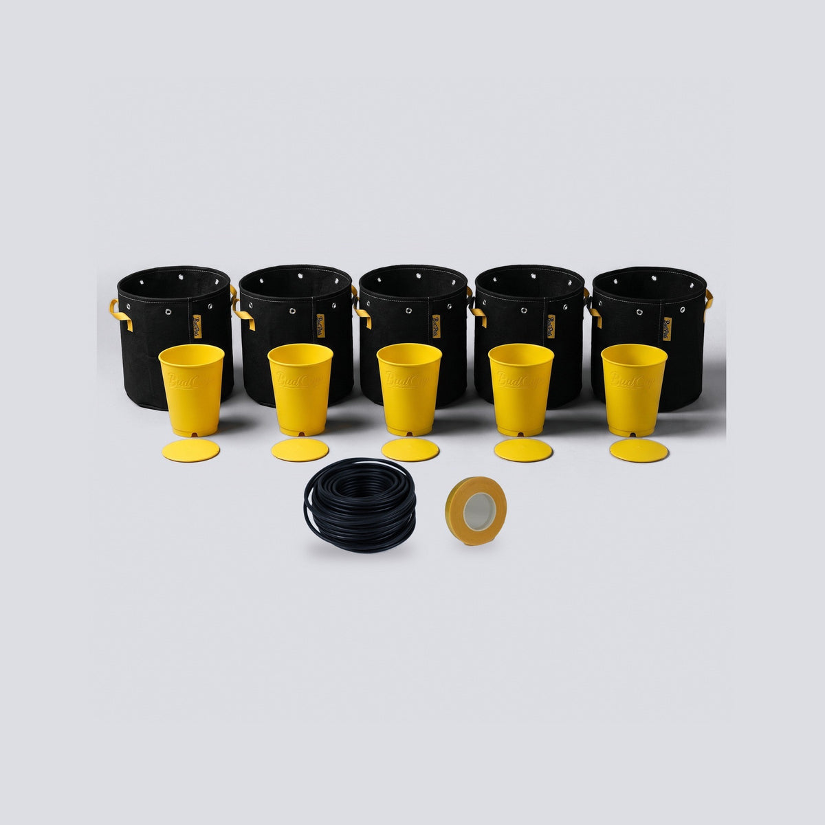 Grow Your Own Gift Set: five yellow seed starting cups, five 1 gallon grow bags, a coil of black soft garden wire and a roll of yellow repair tape
